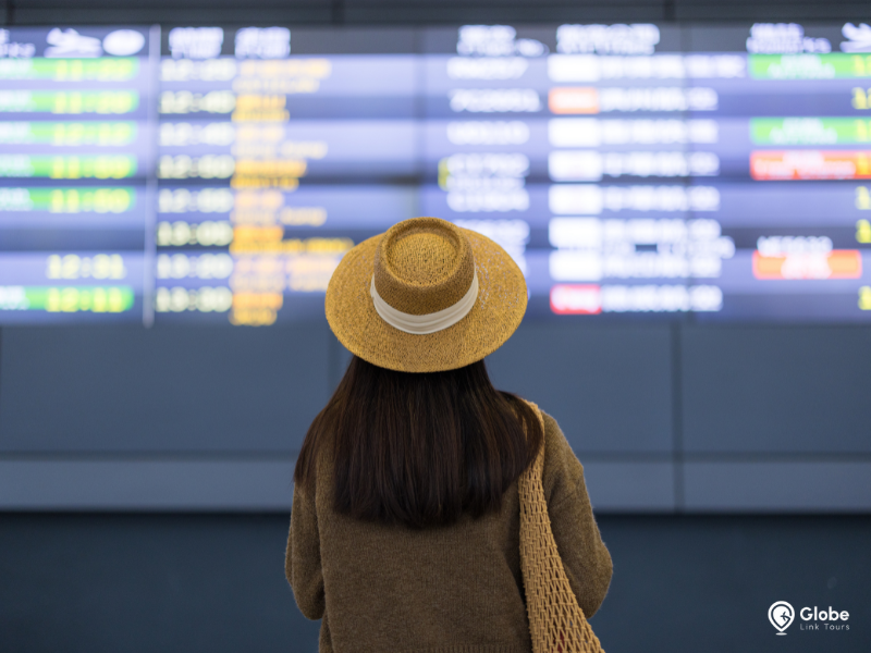 Girl stands facing the LCD