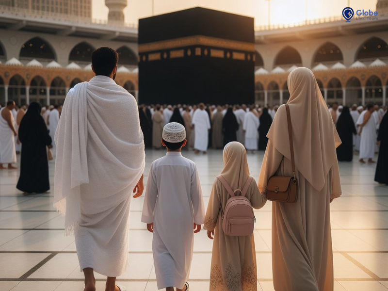 family stand front on kaaba